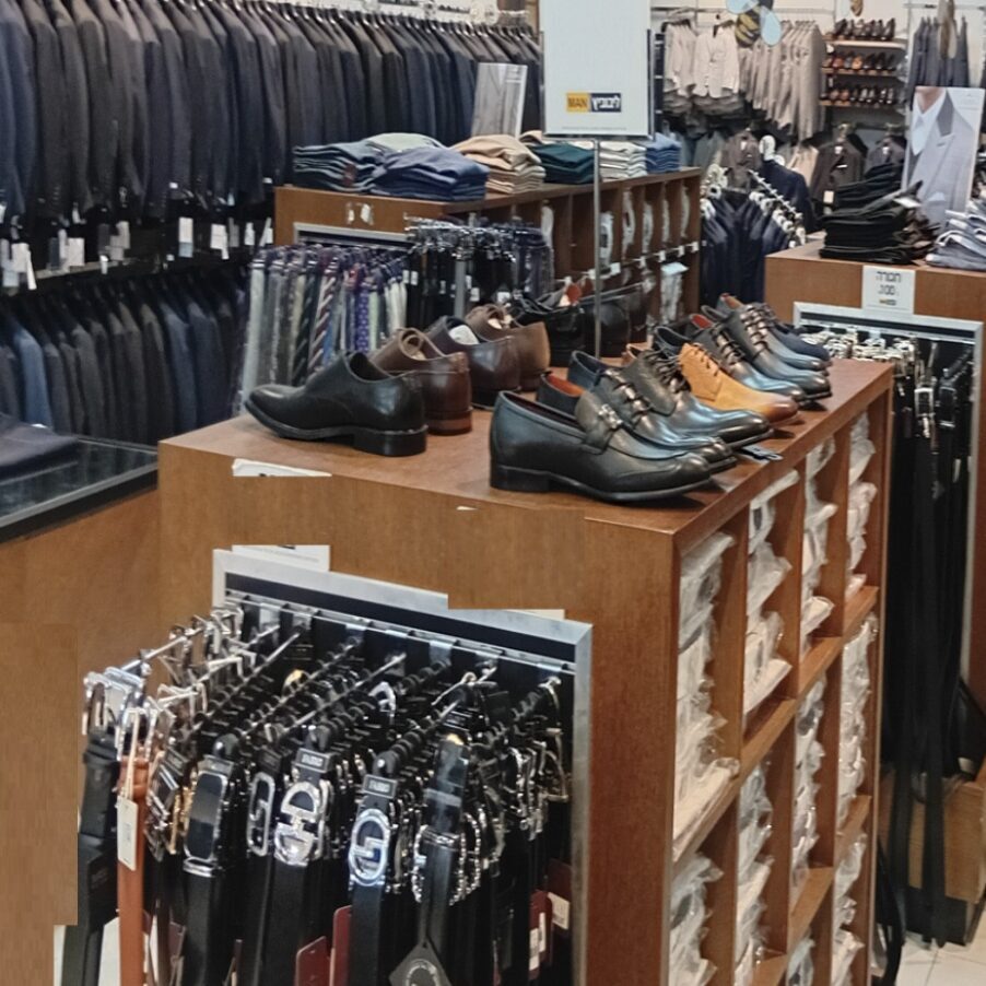 Formal suits and footwear in a store