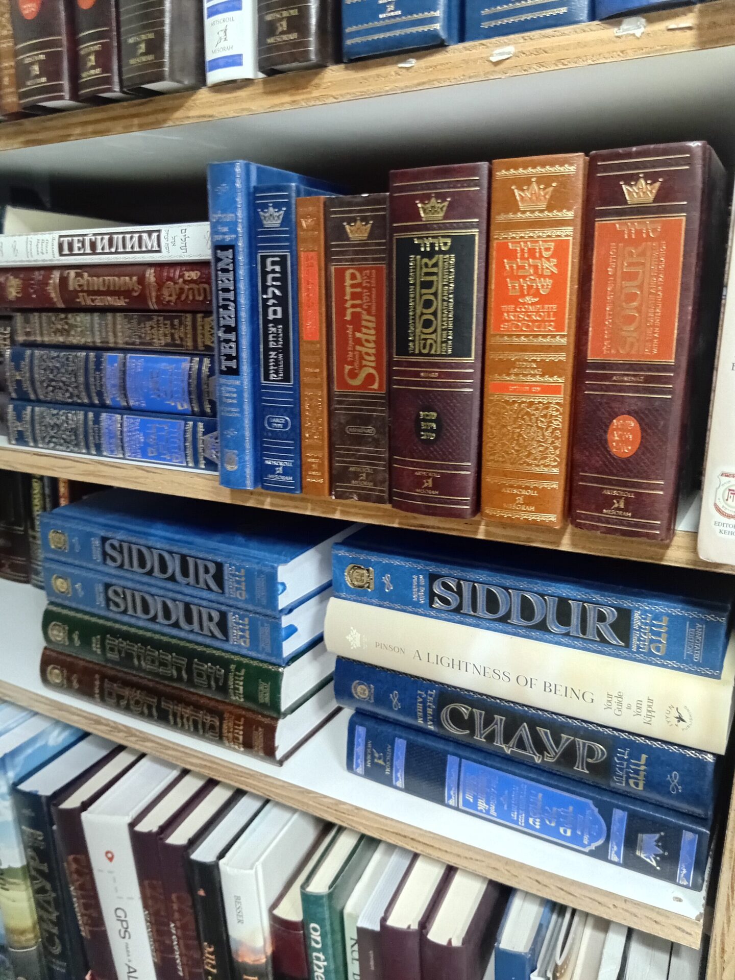 Siddurim on a shelf