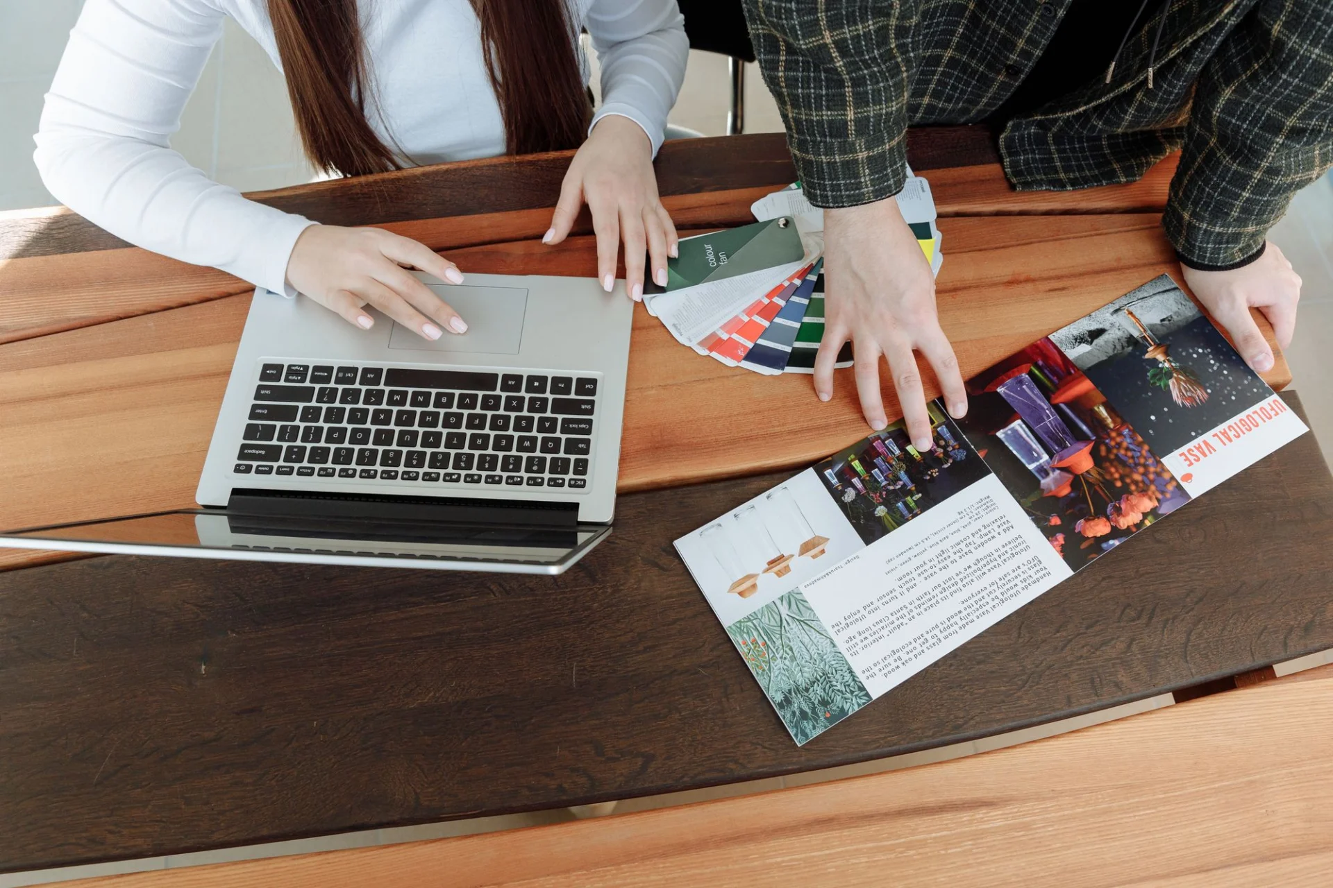 Design work with printed material and colour swatches