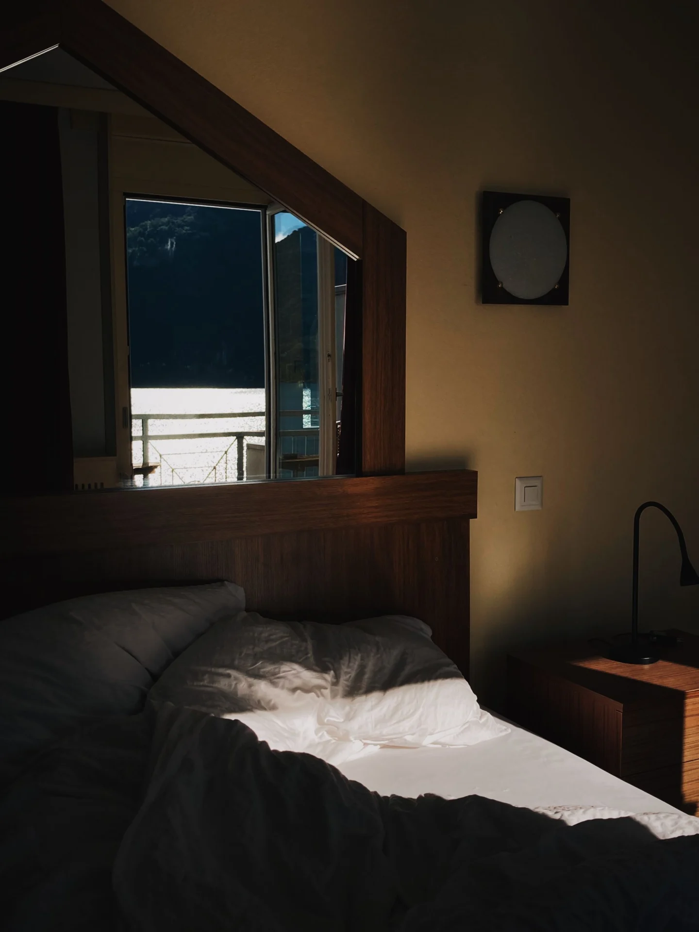 Simple guest bedroom with a window